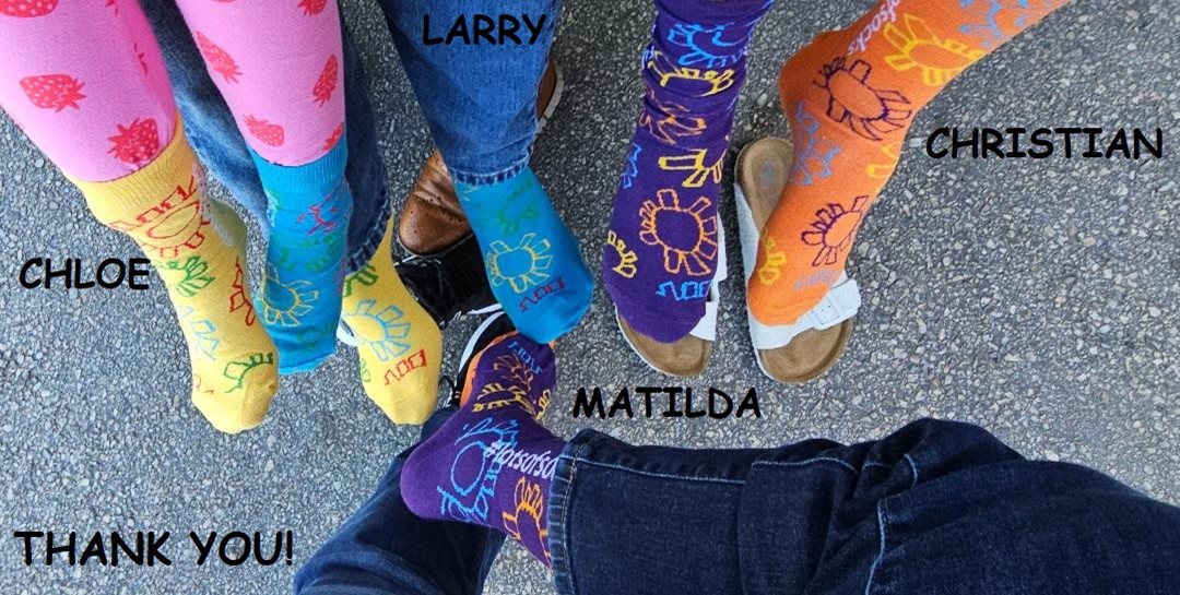 Chloe, Larry, Christian, and Matilda Rocking their Socks!